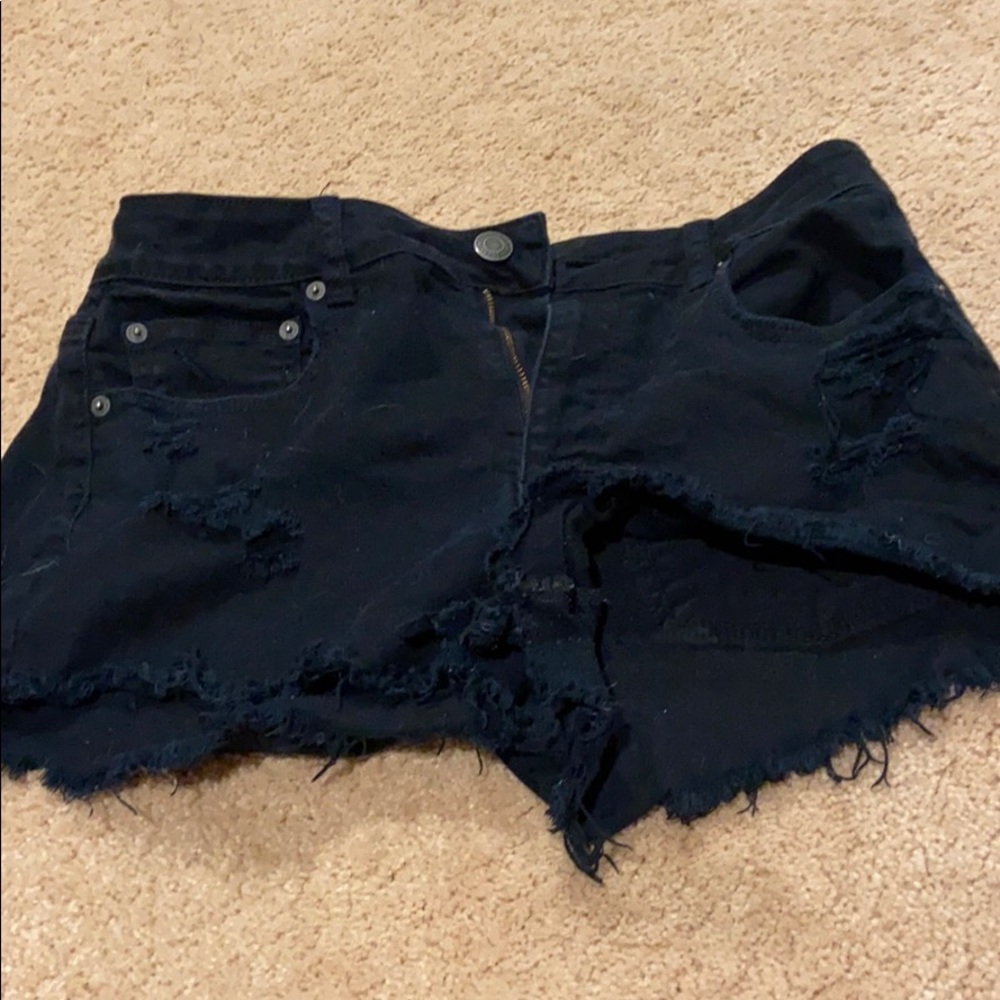 Black distressed American Eagle shorts